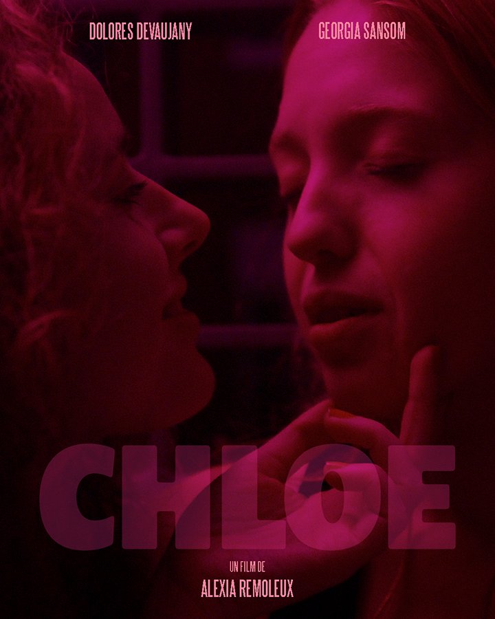 Close up head shot of two young women facing each other. One is touching the face of the other who has her eyes closed. Title of the film 'CHLOE'.